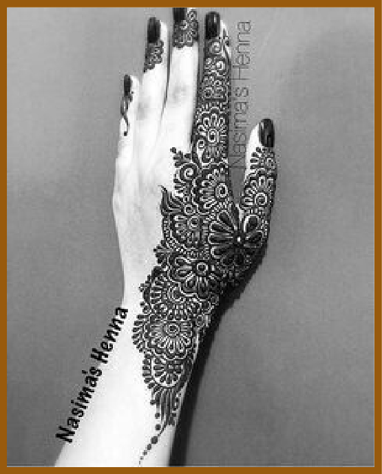 Grid Style Aesthetic Back Hand Mehndi With Filled Motifs